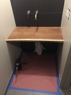 Walnut slab countertop mounted.