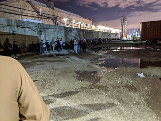 The line. Around the block, along the train line and through a parking lot