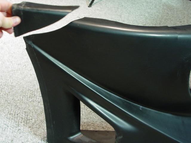 A chunk out of the passenger side of my new urethane bumper