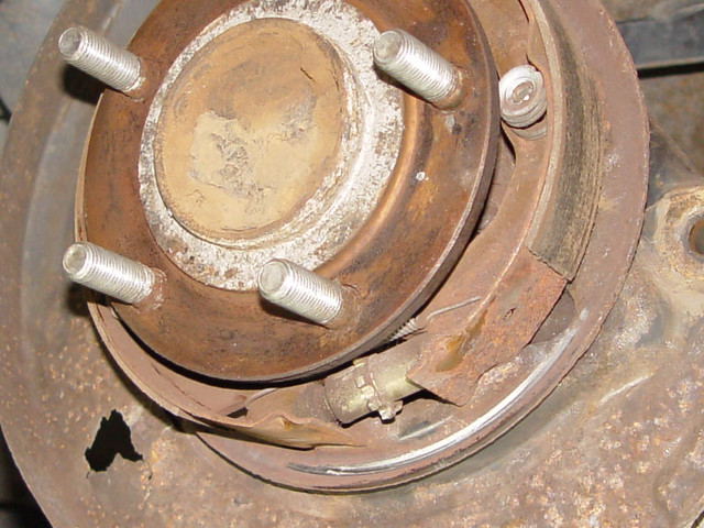 Got my new rotors and pads on and had all kinds of grinding... So I took them back off to find th...