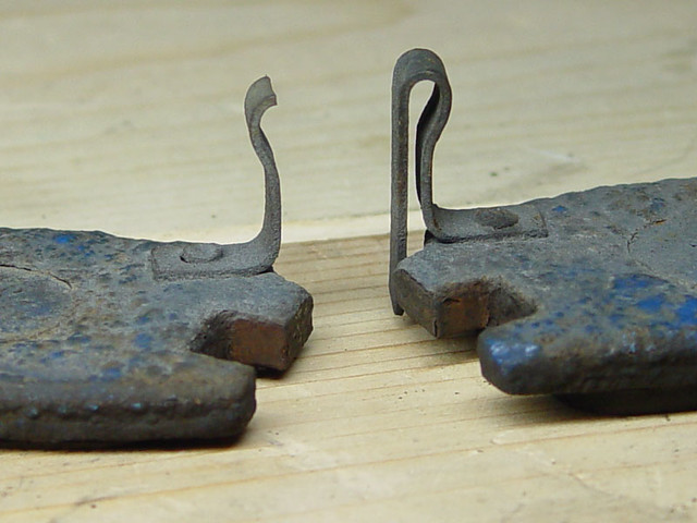 Wear indicator broke off... which explains why i didn't hear them squealing