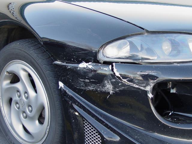 My front bumper and fender after beind backed into