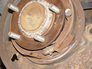 Got my new rotors and pads on and had all kinds of grinding... So I took them back off to find th...