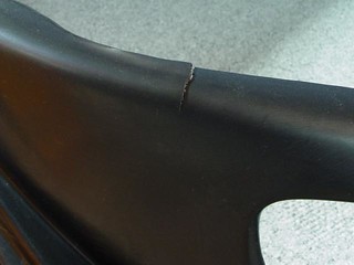 Broken - A second tear below the passenger side headlight of the urethane bumper