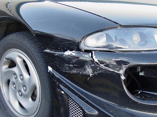 Broken - My front bumper and fender after beind backed into