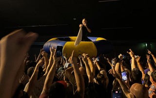 Shows - Prof crowd surfing on the lake trampoline