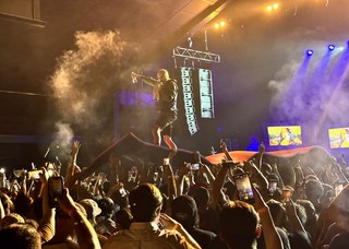 Shows - Crowd surfing on a lake mat