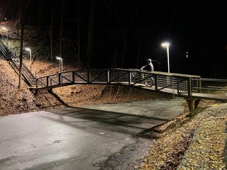 Biking - "Hey, Mitch, can you ride a wheelie across that bridge?" "I'll try"