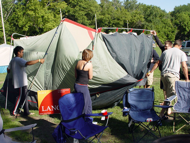 Moving a tent for our neighbors