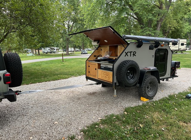 Kari wanted the camper to face the opposite way. I spun it around by hand but then it was out-of-level... No problem.