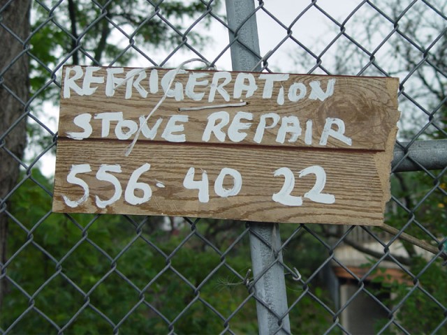 A sign in Maywood