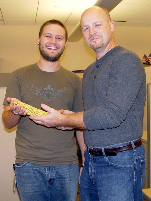 Rico presenting me with the biggest piece of corn ever