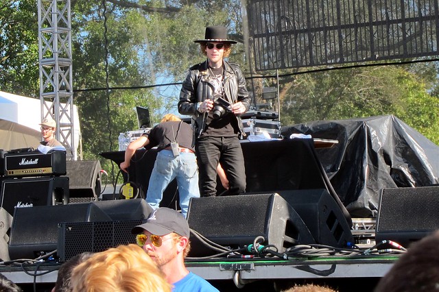 DJ Klever throwing out some Polaroids