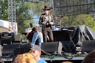 Camera - DJ Klever throwing out some Polaroids