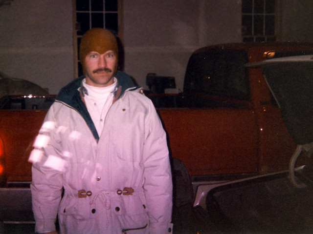 Dad wearing my hat after work