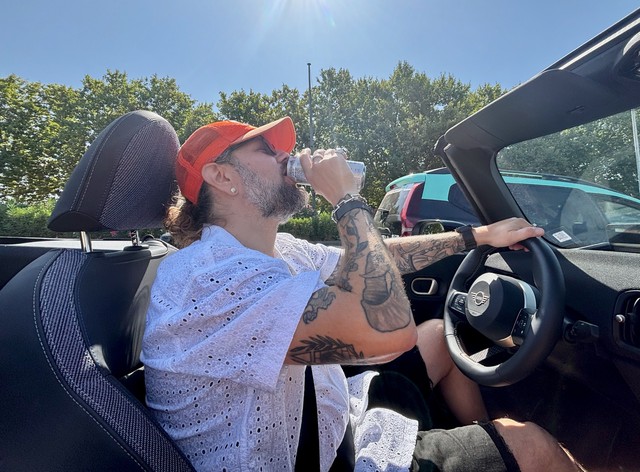 Mini convertible: Acquired. Monster energy drink: being slammed.