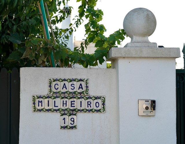 Even house numbers embrace the Portugal tiles