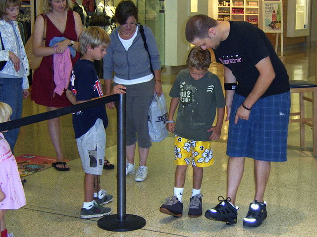 Showing a kid how to heel