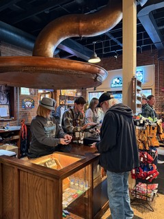 This gift shop has a giant beer kettle hood