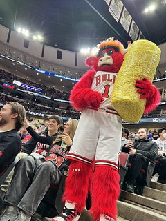 Benny is about to throw some popcorn all over everyone sitting next to Terrell Owens