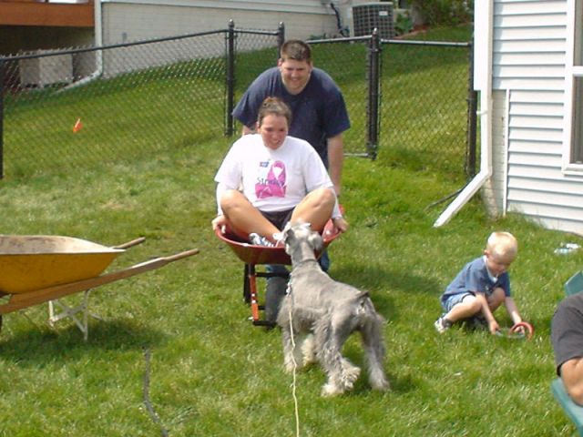 Kevi giving Kari wheelbarrow rides