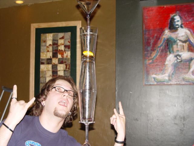 3 martini glasses, 3 pint glasses, and a penis on the wall