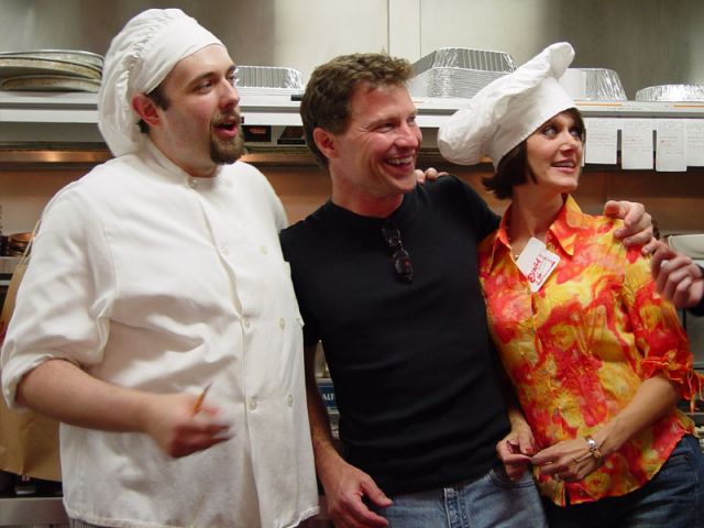Mom and Dad with John, the kitchen manager