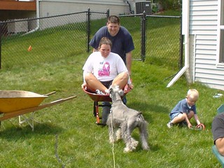 Kevi giving Kari wheelbarrow rides