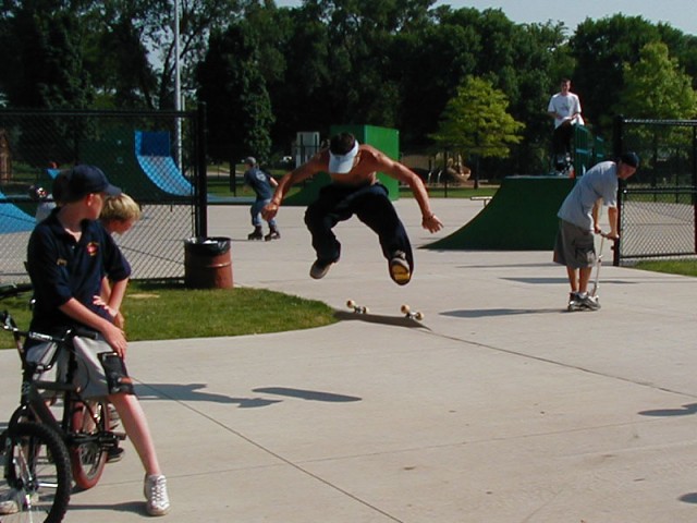 Aaron busting a heelflip