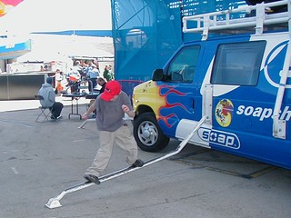 A kid sliding the van rail