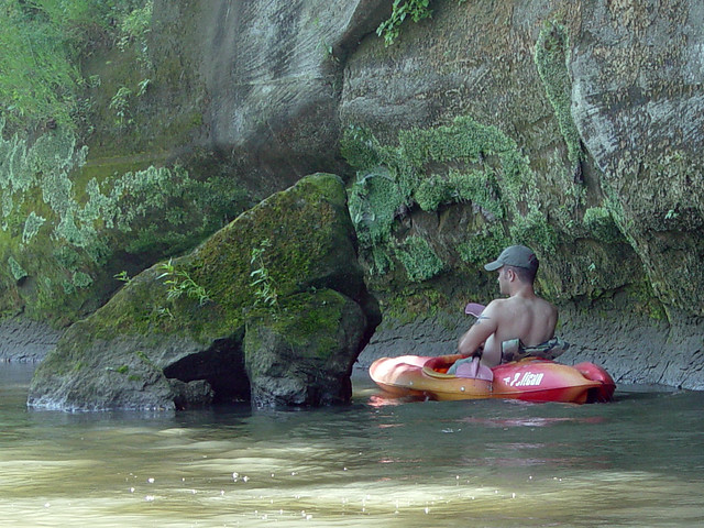 Zach going between some rock