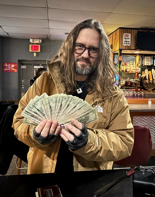 Took a couple hundred out of an ATM that dispensed only fives... Dammit.