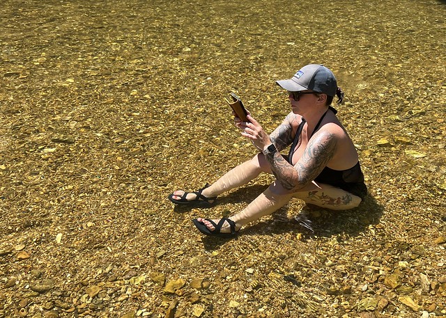 You can barely tell that she's sitting in water. So wild.