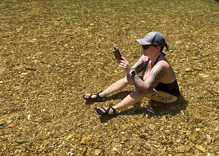 You can barely tell that she's sitting in water. So wild.