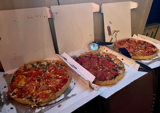 Kari thought we needed 3 large deep dish pizzas for 6 people, lol