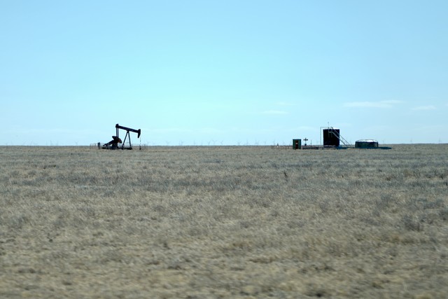 This was hard to capture at 80mph... but I liked the juxtaposition of the oil well with the wind ...