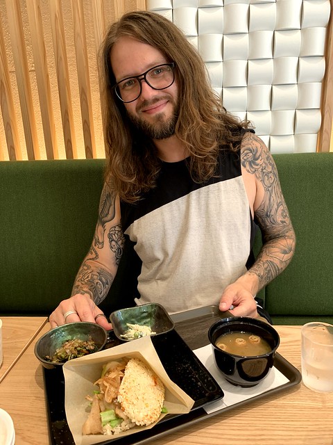 Eatin this weird rice cake burger thing.