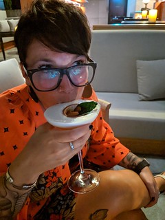 Drinks - This martini had a little orange rind boat with almonds in it