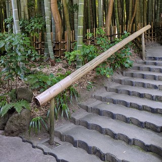 A big ol bamboo railing leading into the bamboo garden