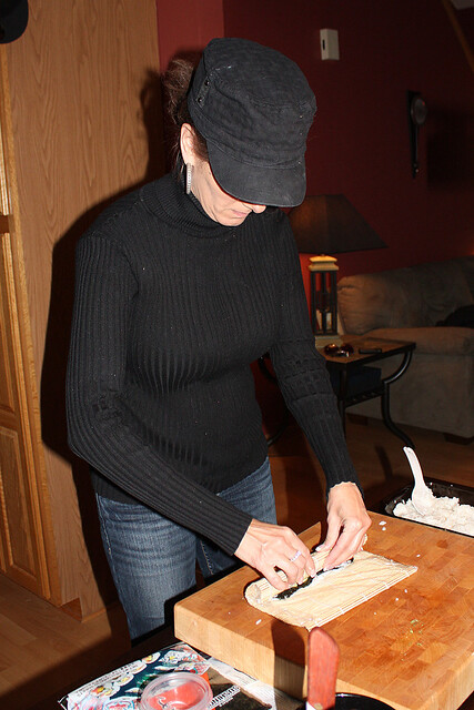 Mom, rolling sushi