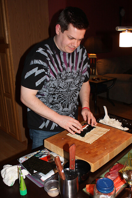 Nick, rolling sushi