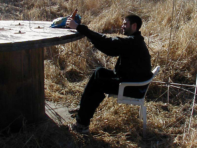 Giant Table, 2 Legged Chair, a beer, and Some Chips