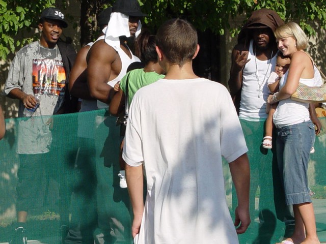 Trick Daddy getting pictures taken with babies, haha - 'Trick love the kids!' 