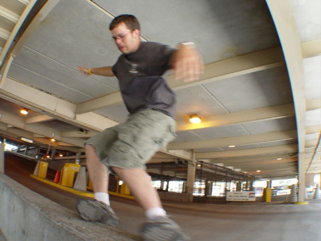 Zach busting a royale on a ledge downtown