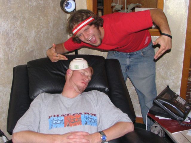 Rankin fell asleep, so I put a bowl of cheese on his head