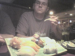 Sushi - Zach and his first sushi at Taki