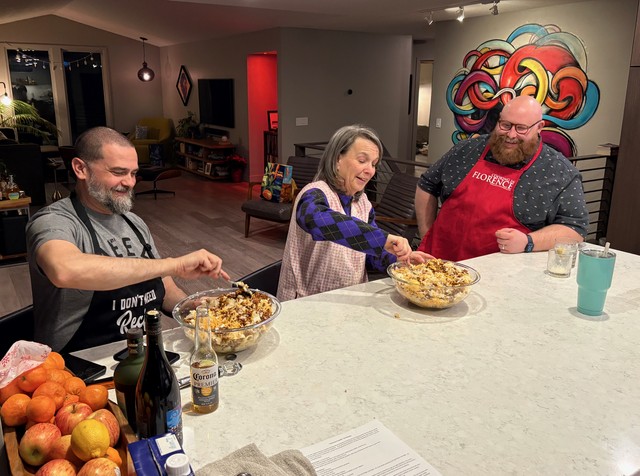 Stirrin up the taters, onions, chorizo, and cheese