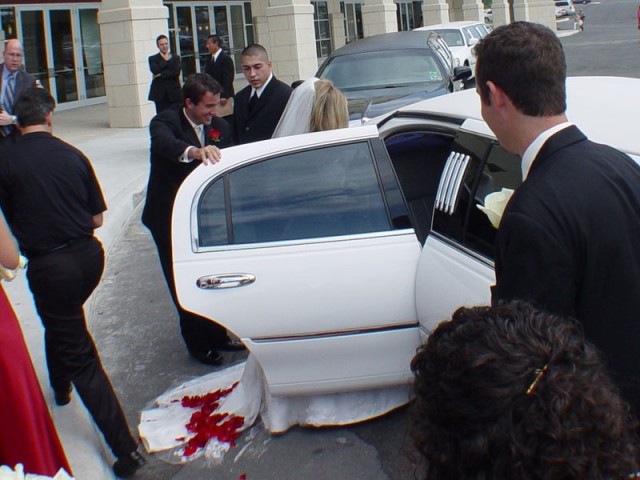 Chris and Bre'anna getting in their limo