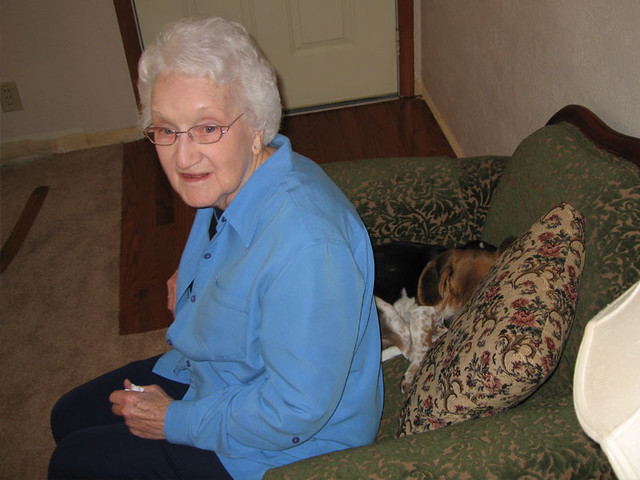 Esther about to sit on Arnold