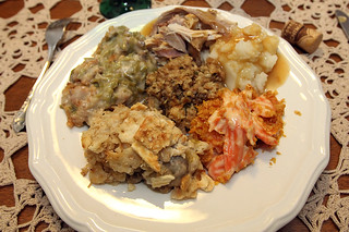 Turkey, mashed potatoes, carrot casserole, oysters, green bean casserole, and stuffing